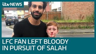 Liverpool fan meets hero Mo Salah after running into lamppost  ITV News [upl. by Irrej176]