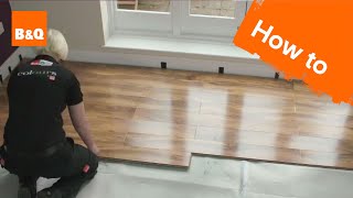 How to lay flooring part 3 laying locking laminate [upl. by Lietman]