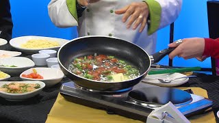 Olive Garden demonstrates how to make shrimp scampi [upl. by Haronid]