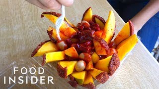 Whole Mangos Are Covered In Chamoy Paste [upl. by Nailij]